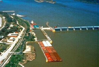 Picture of Lock and Dam 24 with barge locking thru